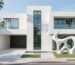 Fasad desain rumah minimalis modern dua lantai berwarna putih dengan garis tegas, jendela besar, dan elemen patung sebagai aksen taman depan