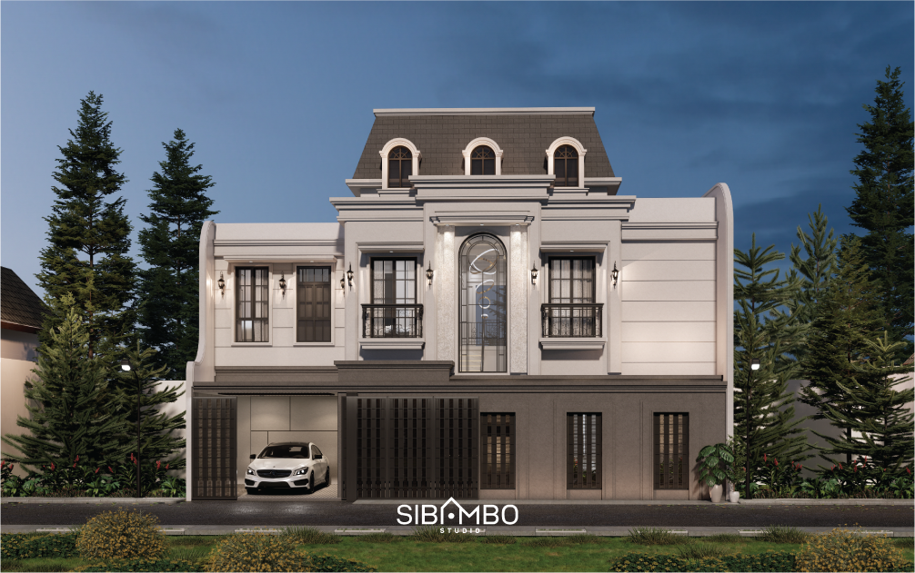 Fasad Baliq Mufid House pada malam hari dengan pencahayaan hangat pada rumah klasik Surabaya