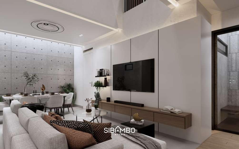 Ruang keluarga Compact House dengan dinding beton ekspos dan layout terbuka pada rumah industrial Jakarta