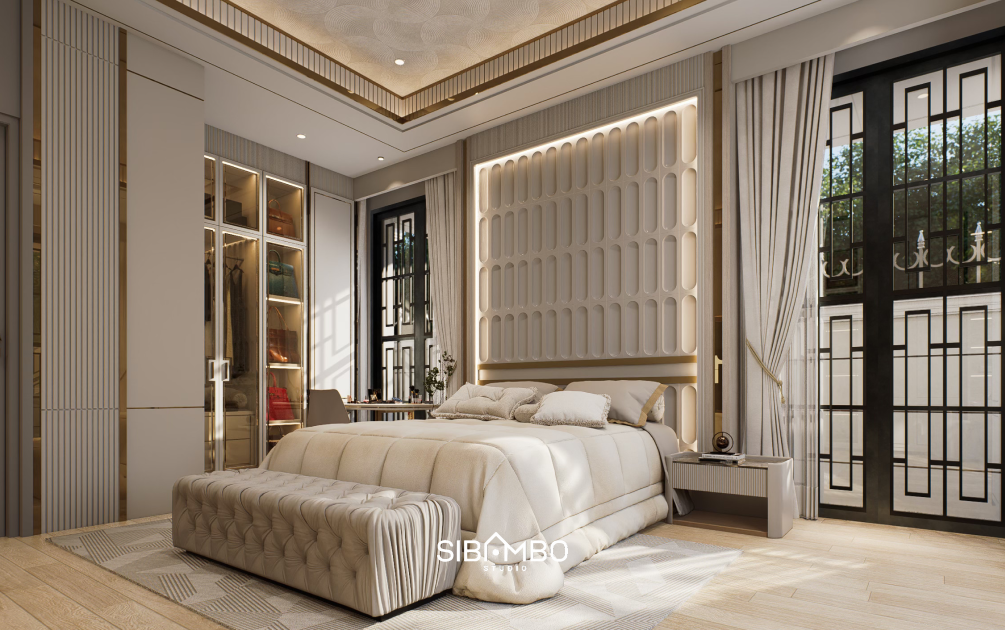 Kamar tidur utama Serenata House dengan headboard dekoratif dan wallpaper pastel