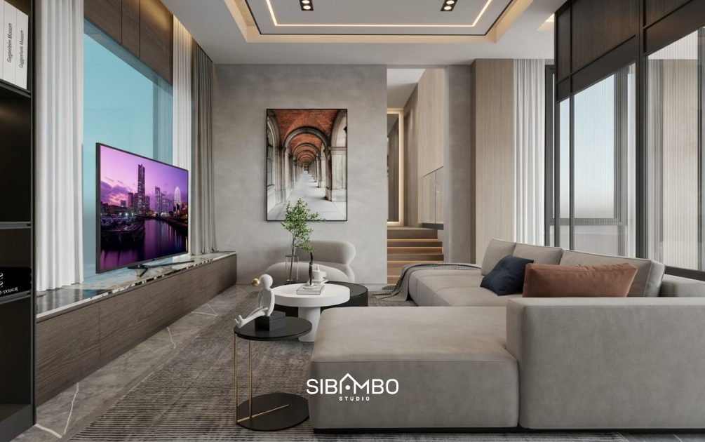 Ruang keluarga Axis House dengan sofa abu muda, kabinet batu bermotif, dan panel kayu bergaya modern kontemporer