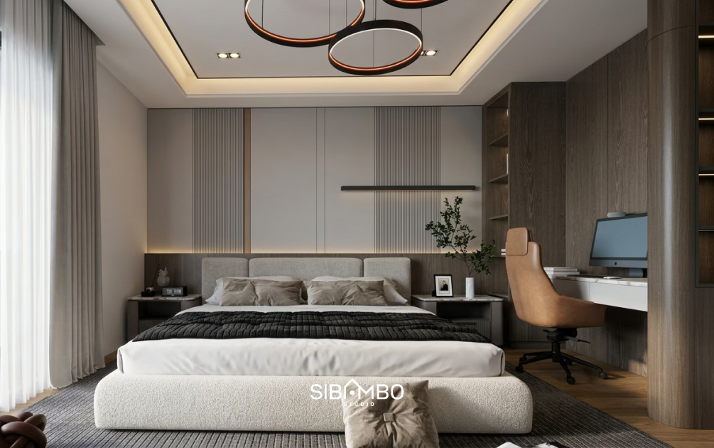 Kamar tidur utama Axis House dengan panel dinding bersirip, lemari kayu gelap, dan meja kerja menyatu